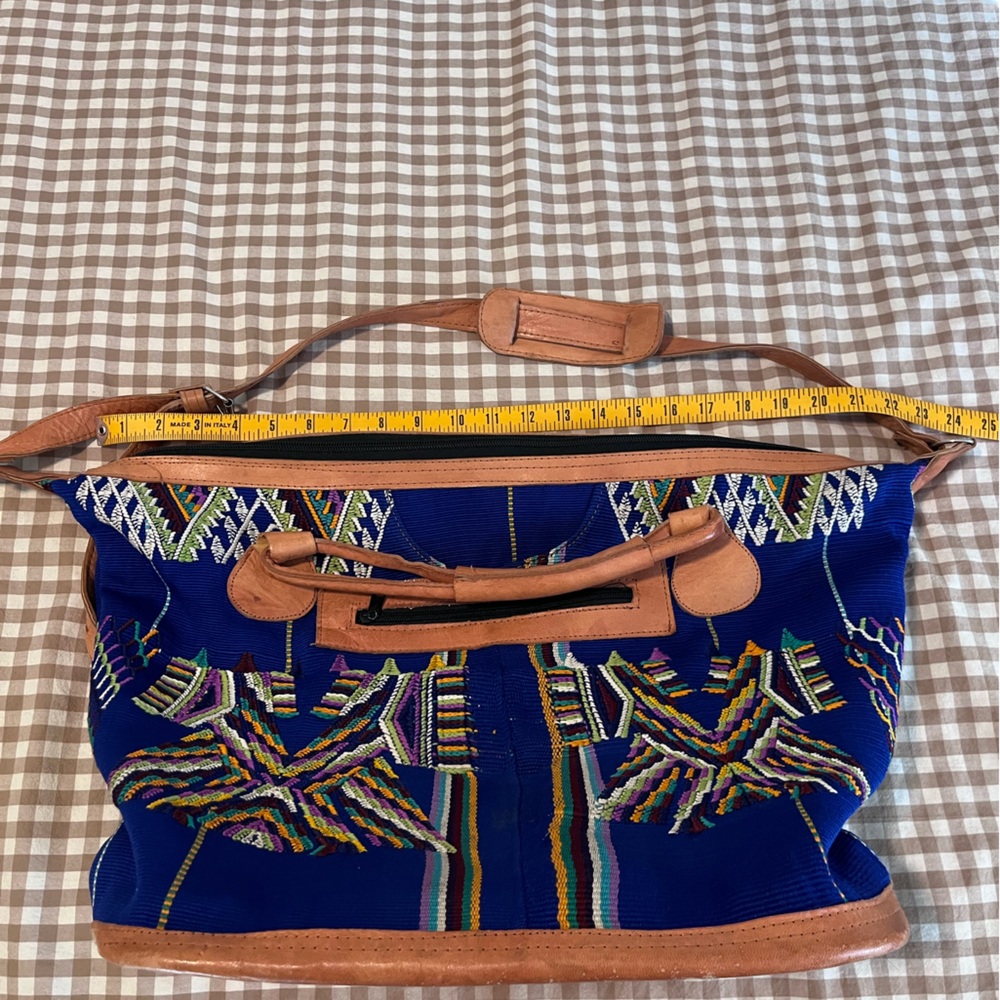 Embroidered tapestry weekender bag with leather handles